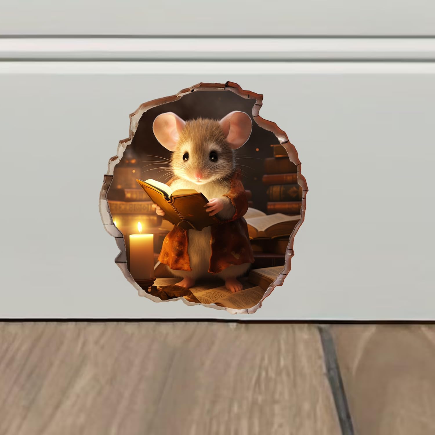 A whimsical wall decal featuring an illustrated mouse reading a glowing book by candlelight, designed to appear as a 3D hole torn through drywall with warm, cozy interior lighting effects visible behind it.